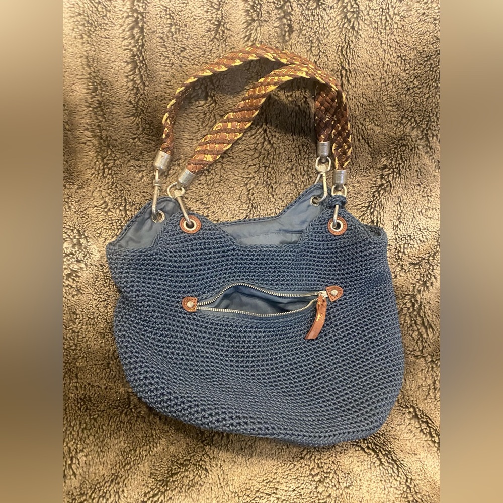 The Sak durable knit blue bag. There is a compartment for everything!